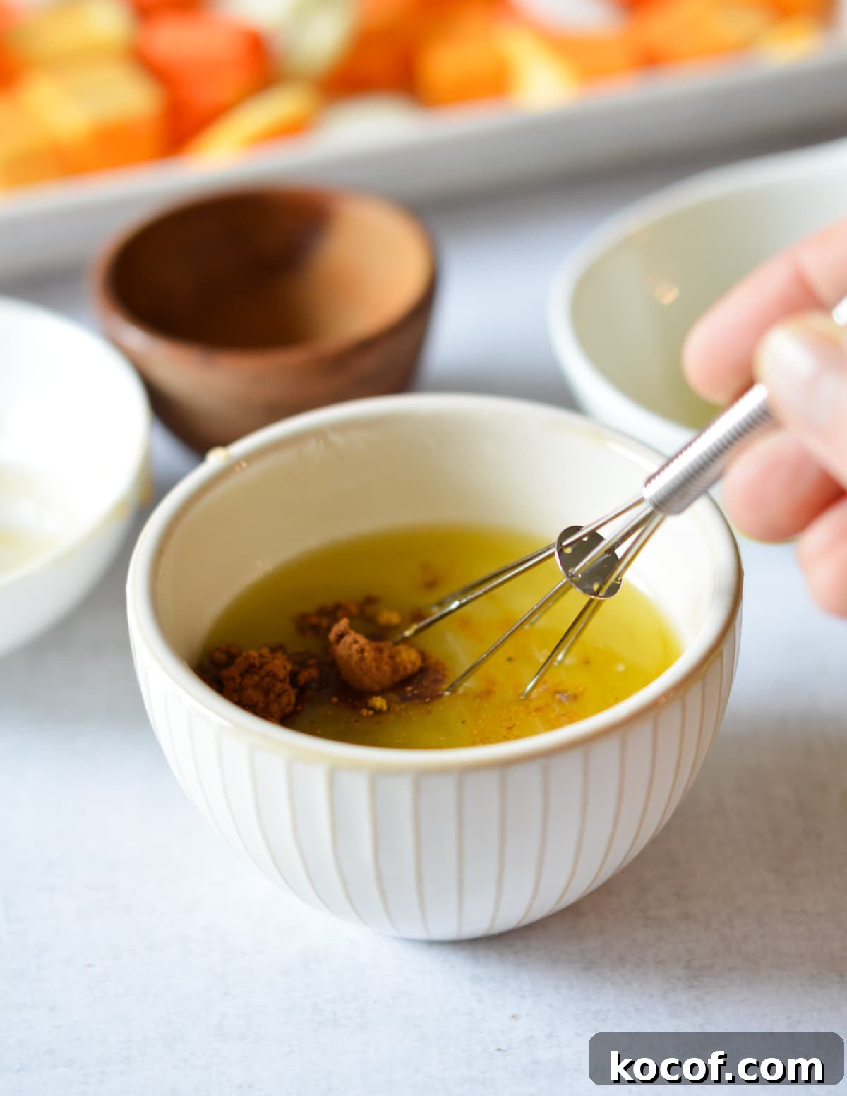 butter, oil, sugar, and spices in a small bowl with a small whisk.