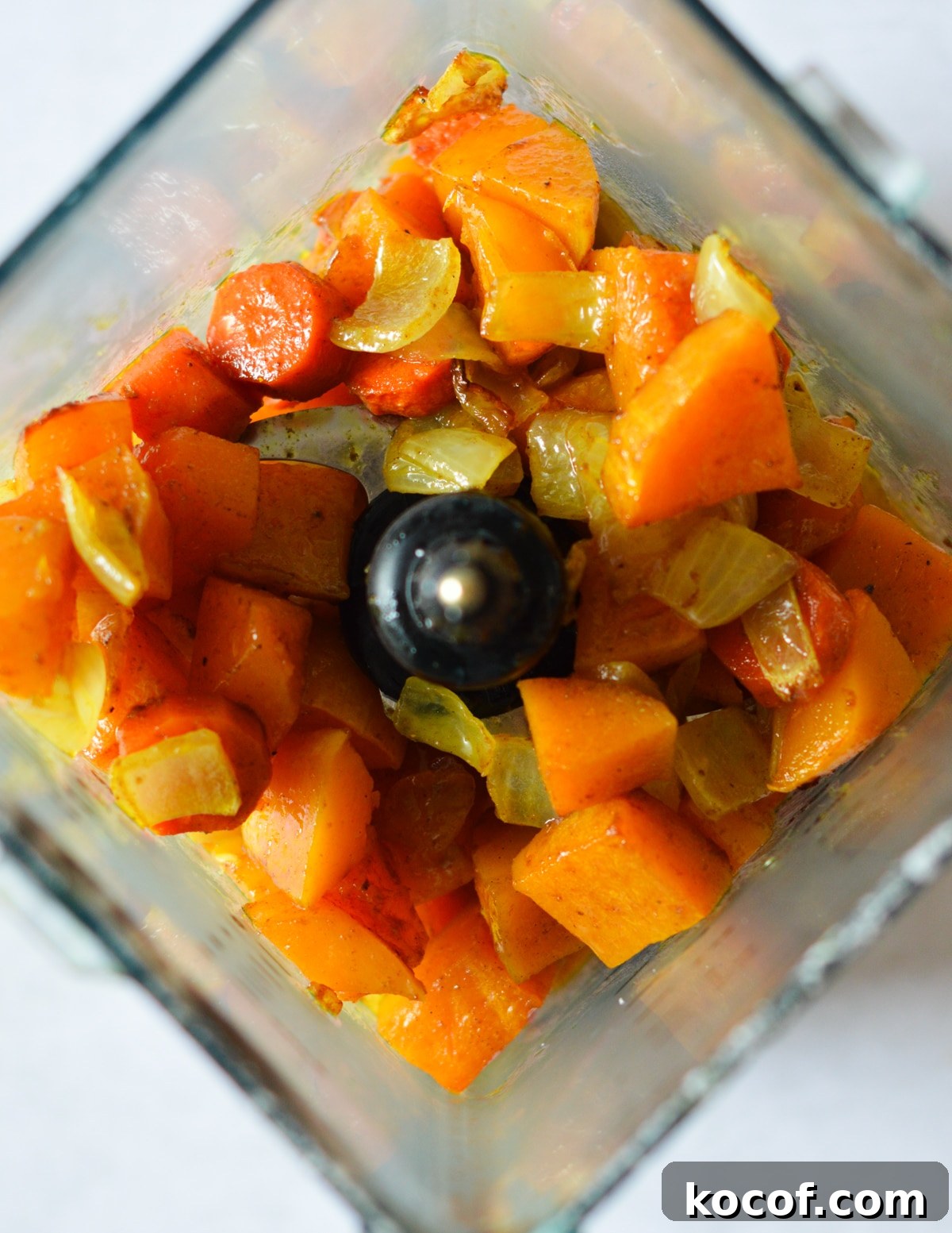 roasted butternut squash, onion, and carrots in a blender. 