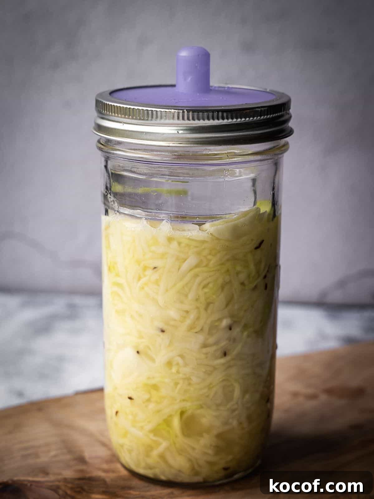 Mason jar with shredded cabbage.