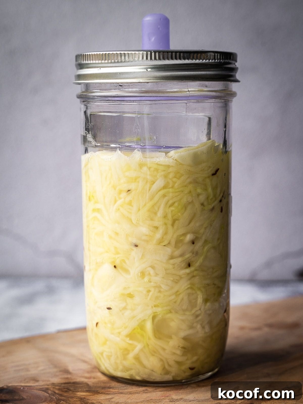 Mason jar with shredded cabbage.