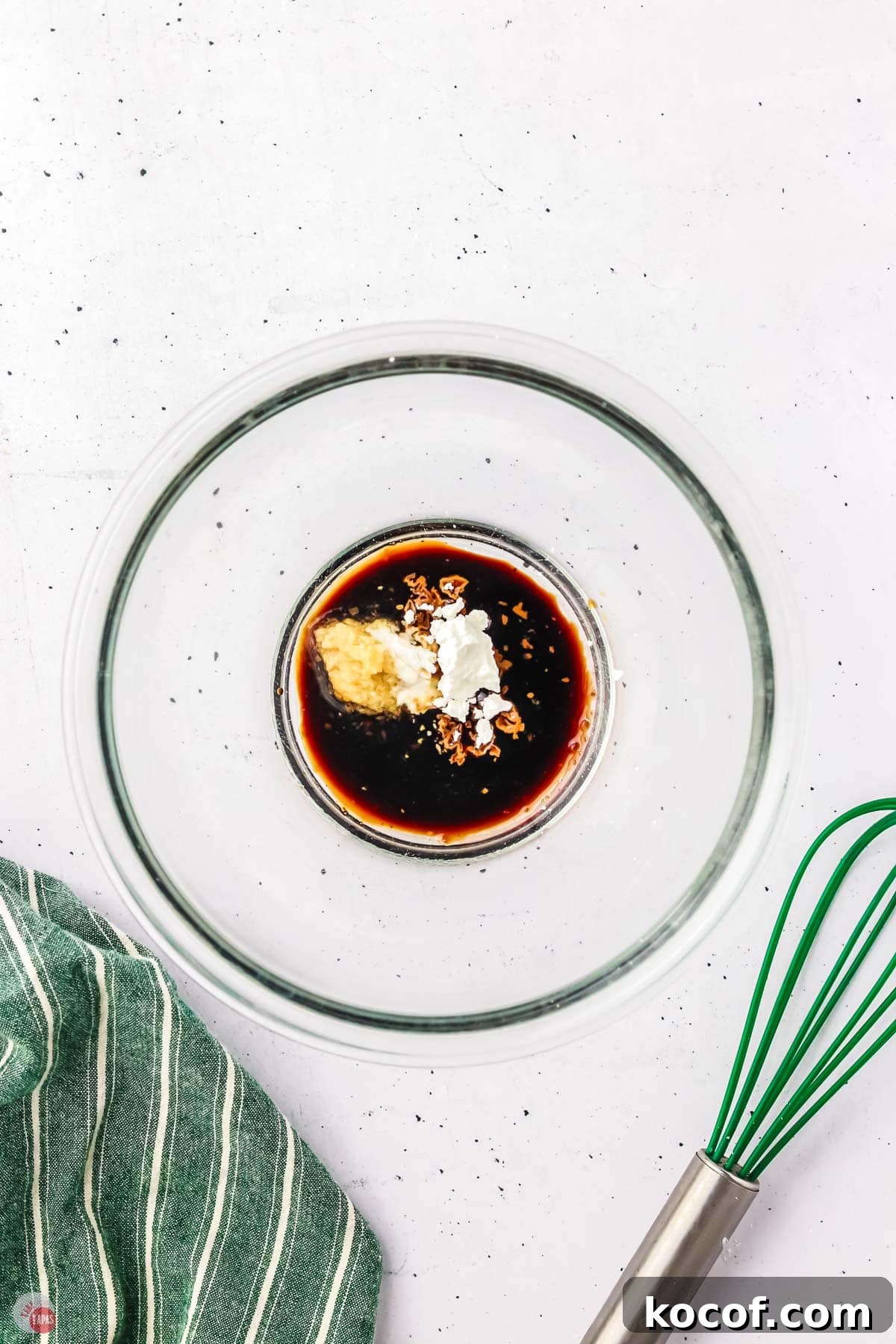 soy sauce and spices in a clear bowl