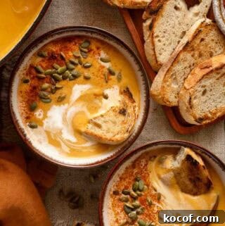 two bowls of sweet potato pumpkin soup.