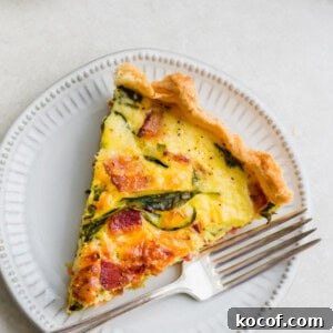 Savory Morning Quiche Recipe for Brunch or Meal Prep 3 A slice of breakfast quiche on a plate.