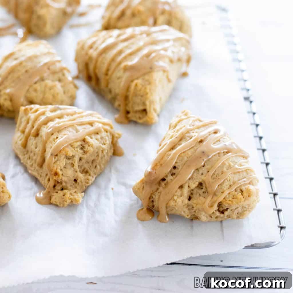 coffee scones on parchment with coffee glaze