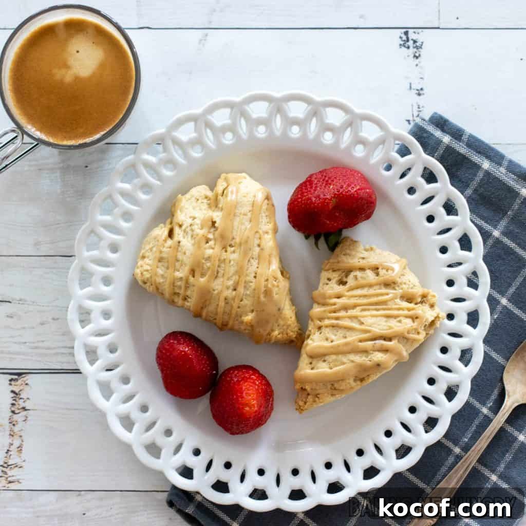 coffee scones recipe served on small plate with strawberries and cup of espresso