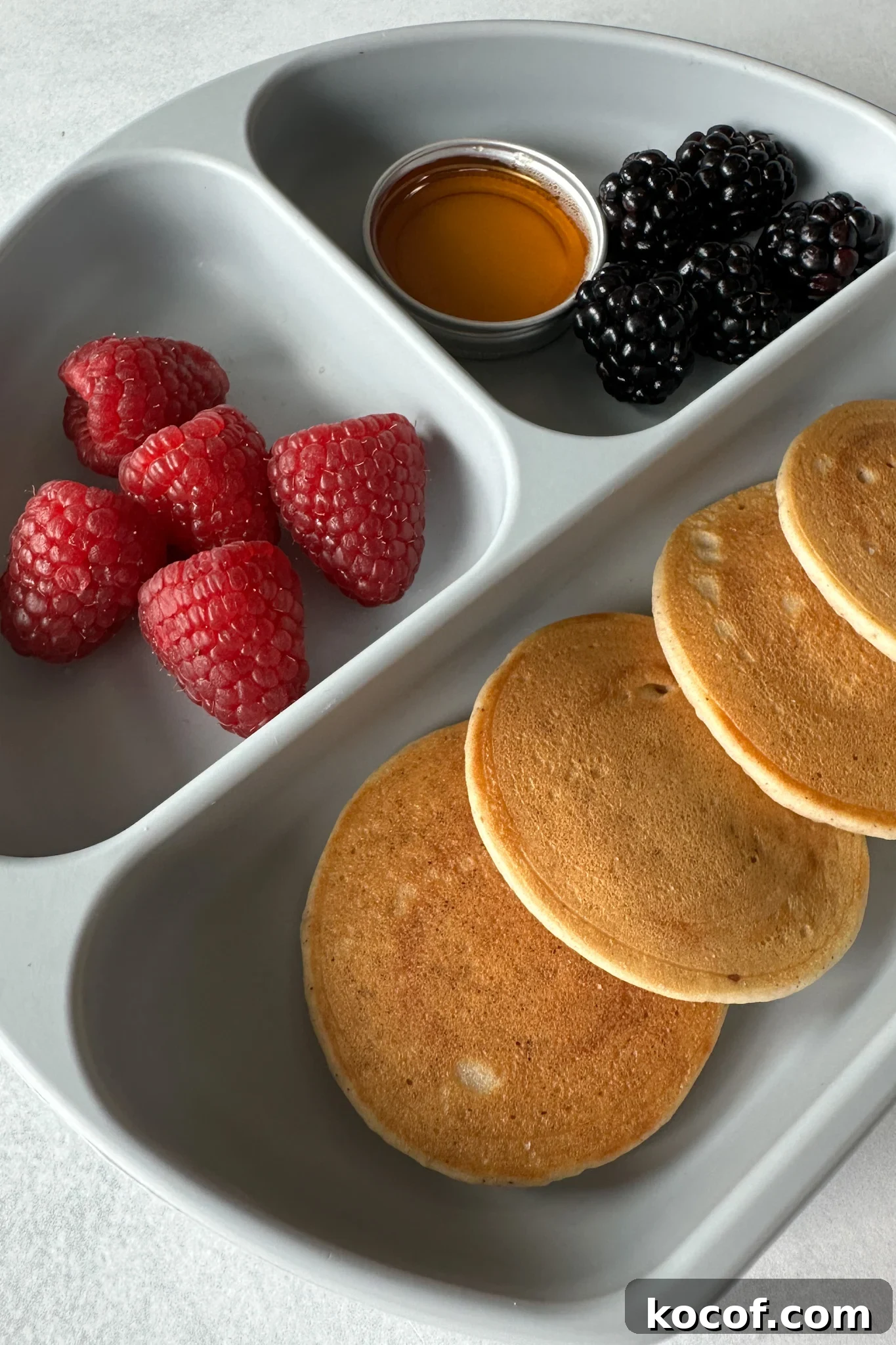 Egg free pancakes served with fruits.