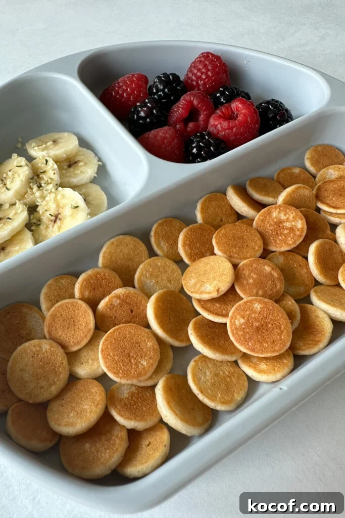 Egg free pancake cereal served with fruits.