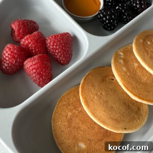 Egg free pancakes served with fruits.