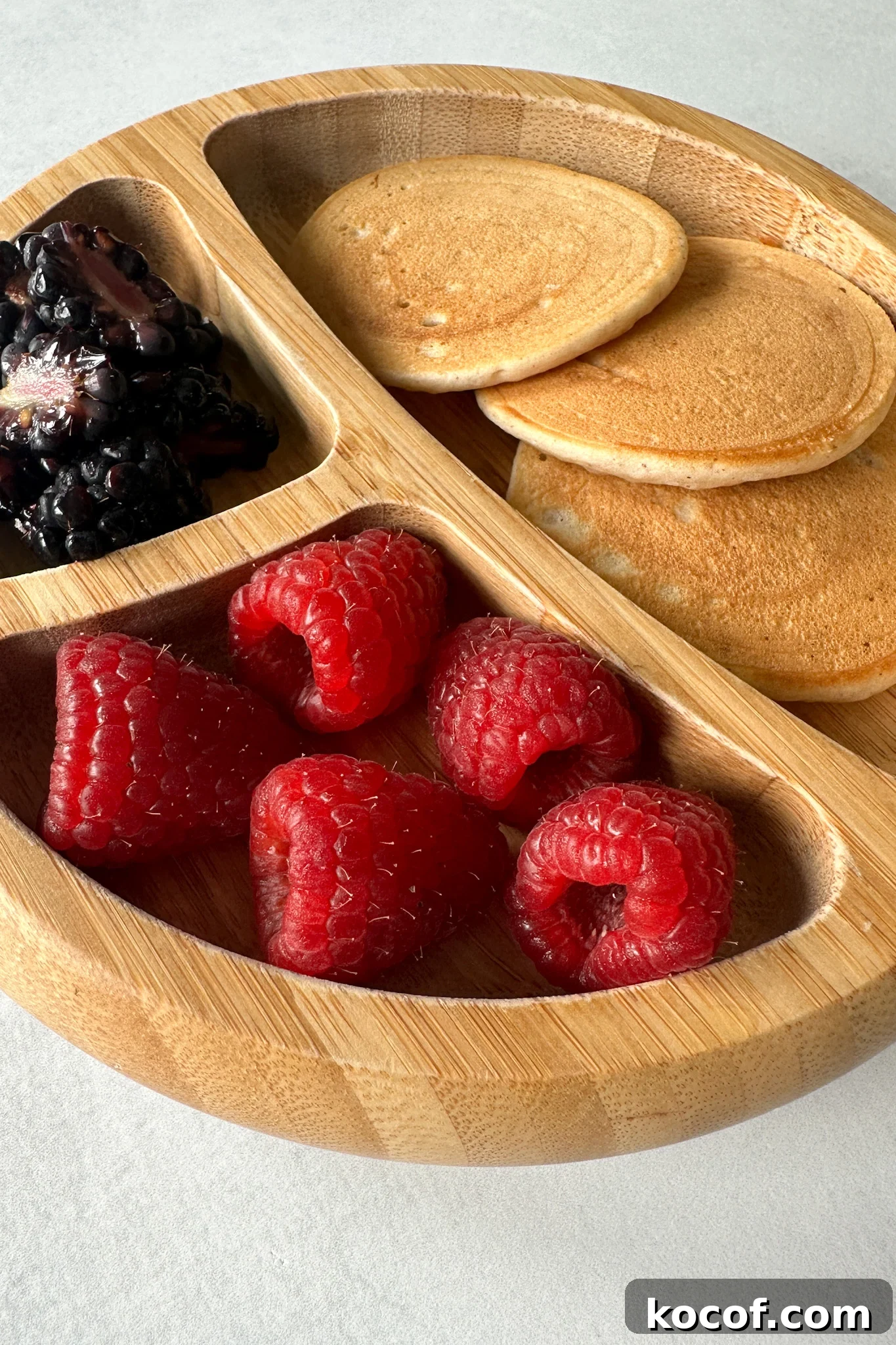 Egg free pancakes served with fruits.