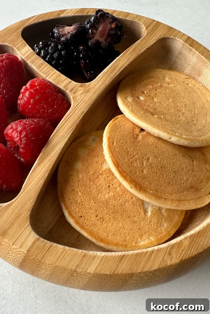 Egg free pancakes served with fruits.