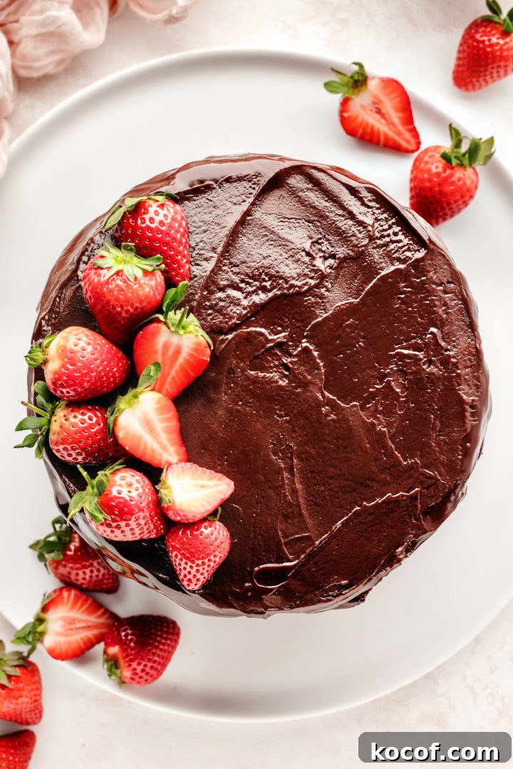 overhead photo of chocolate cake with ganache frosting