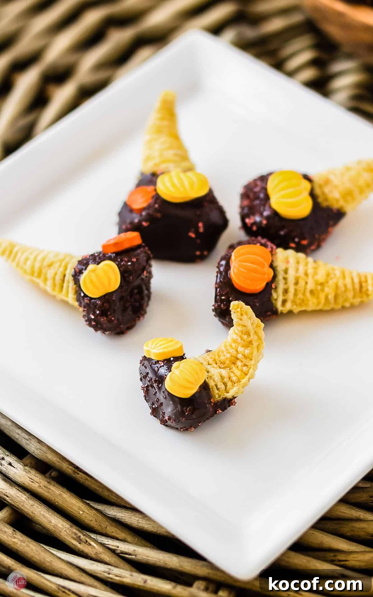 closeup of bugles with chocolate on a white plate