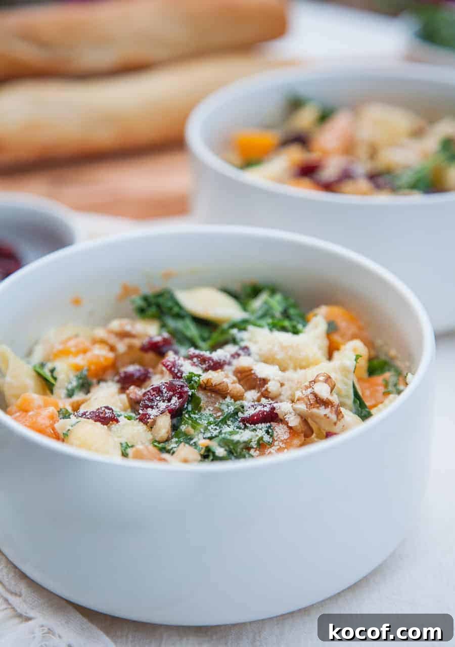 Creamy Roasted Butternut Squash Pasta with Sage and Parmesan 6 Celebrate this season by sharing this Creamy Butternut Squash Kale Pasta with friends and family! This pasta is surprisingly light but packed with winter flavors like fresh butternut squash, kale, cranberries and chopped walnuts. This is a pasta dish that is perfect to share and sure to impress!