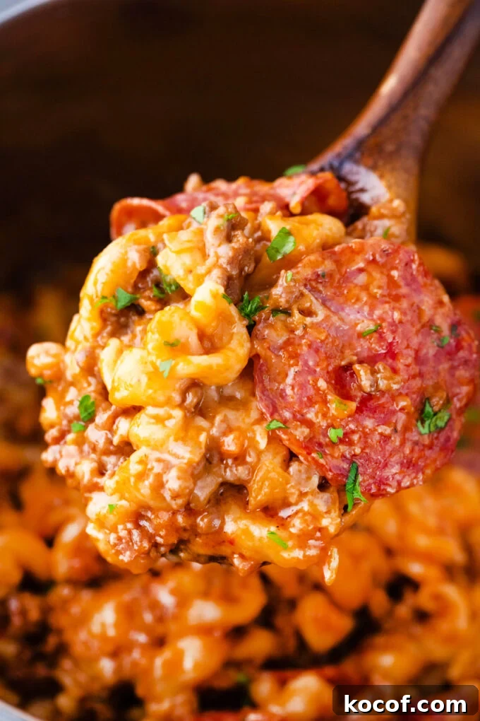 A ladle of instant pot pizza pasta.