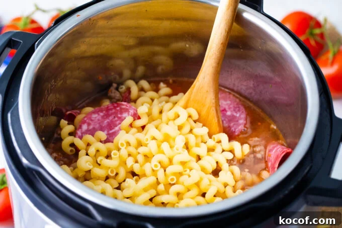 instant pot pizza pasta ingredients in the Instant Pot.
