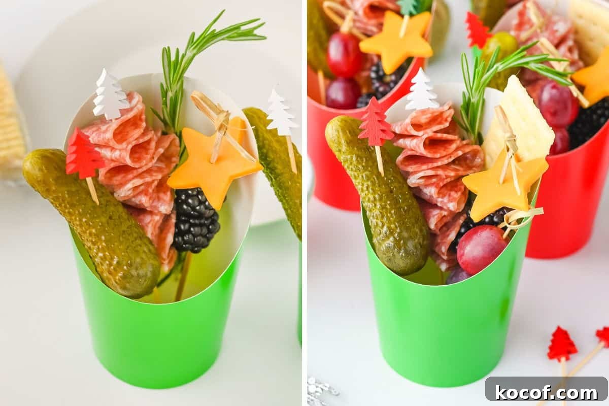 Christmas charcuterie cups with festive picks, showing items being added.
