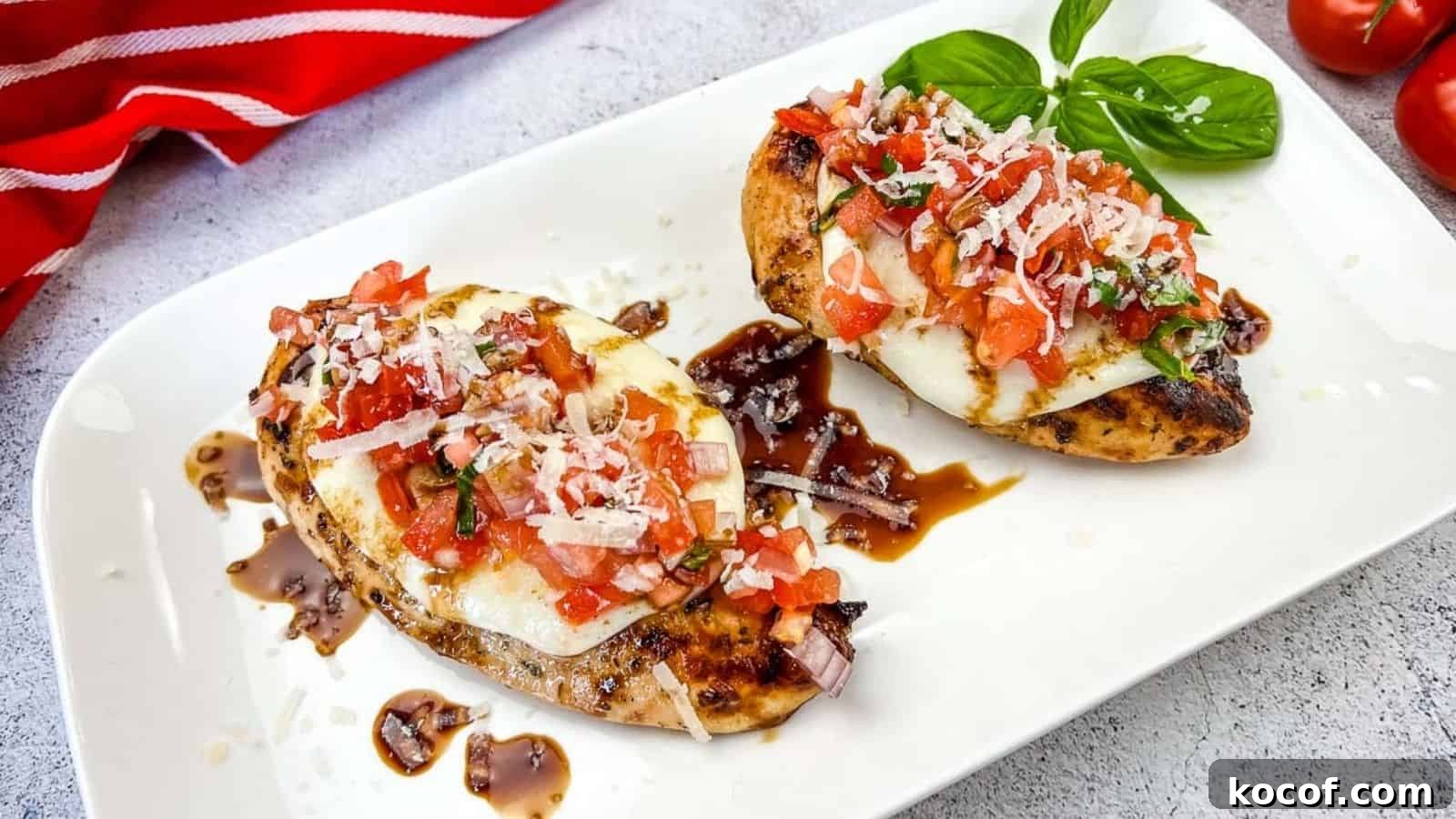 39 Outdoor Grilling Dinners That Make You Ditch the Oven Tonight 30 Grilled Bruschetta Chicken on a white plate.
