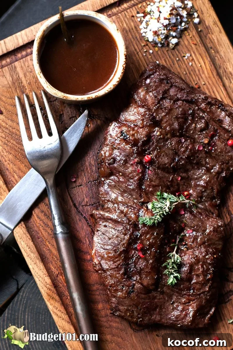 steak on serving board with homemade a1 steak sauce 1