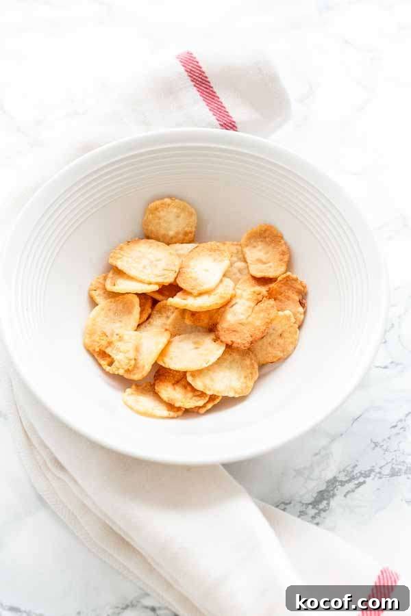 Crispy Air-Fryer Prawn Crackers Recipe for Perfect Crunch 7 Prawn crackers puffed up in a white bowl