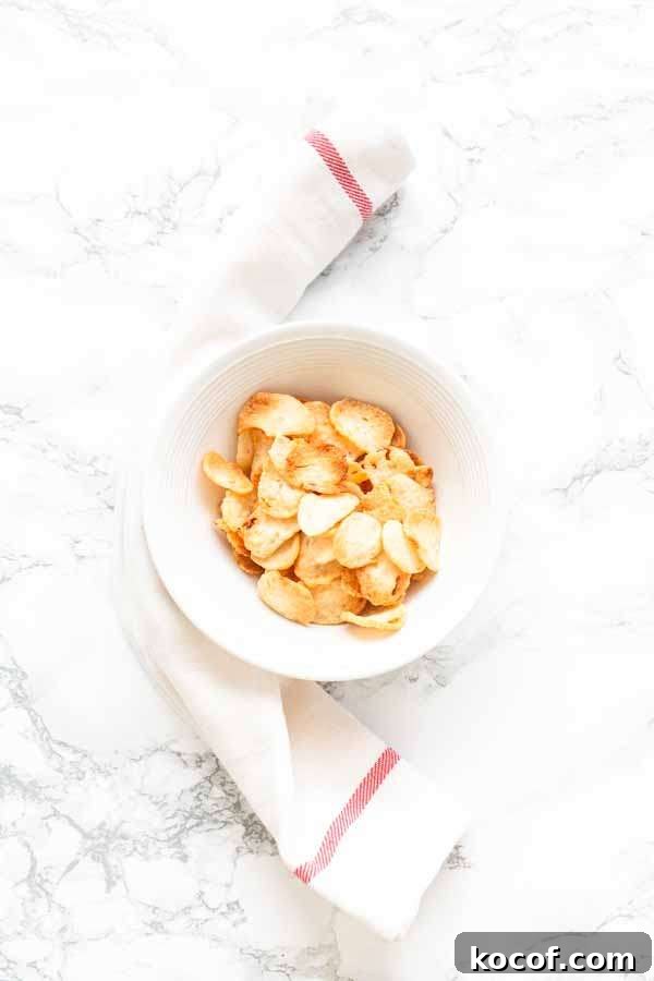 Crispy Air-Fryer Prawn Crackers Recipe for Perfect Crunch 8 Prawn crackers puffed up in a white bowl