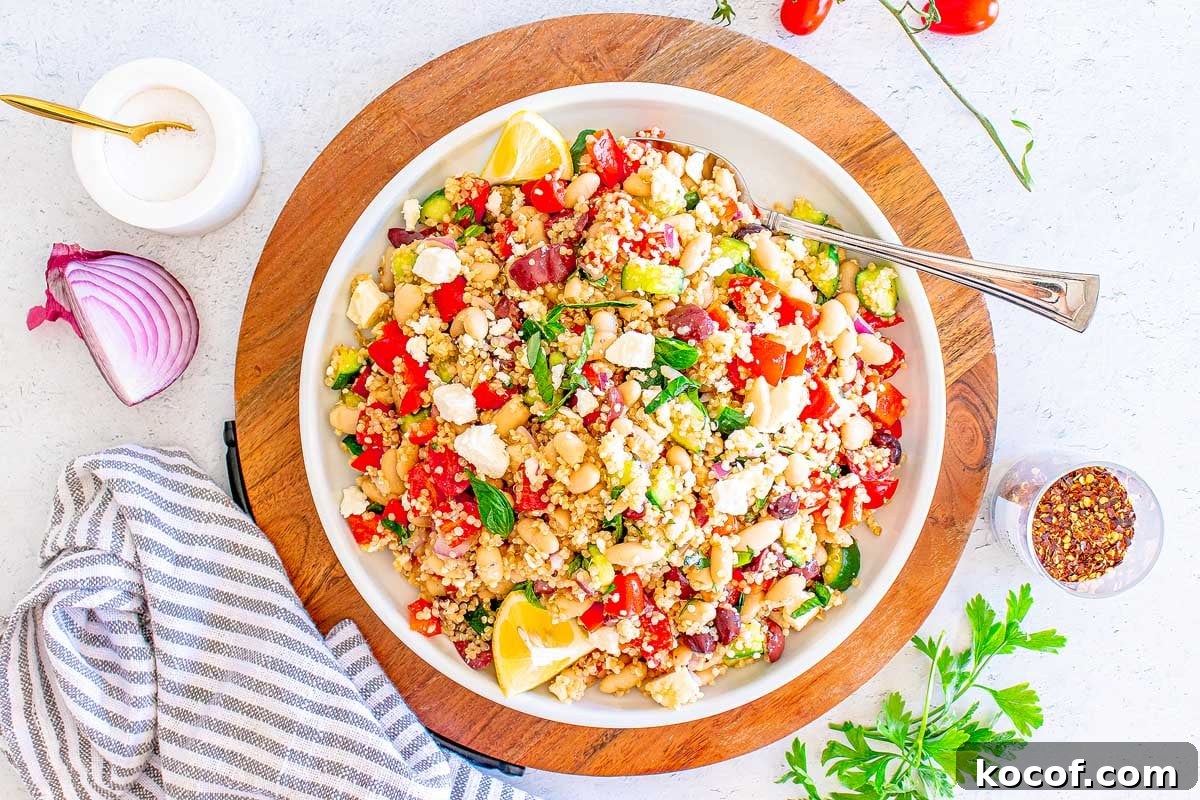 Mediterranean Quinoa Salad with Feta, Cucumbers & Olives 2 A bowl full of quinoa salad.
