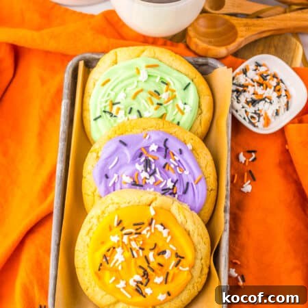 an overhead view of copycat lofthouse halloween sugar cookies on metal serving tray