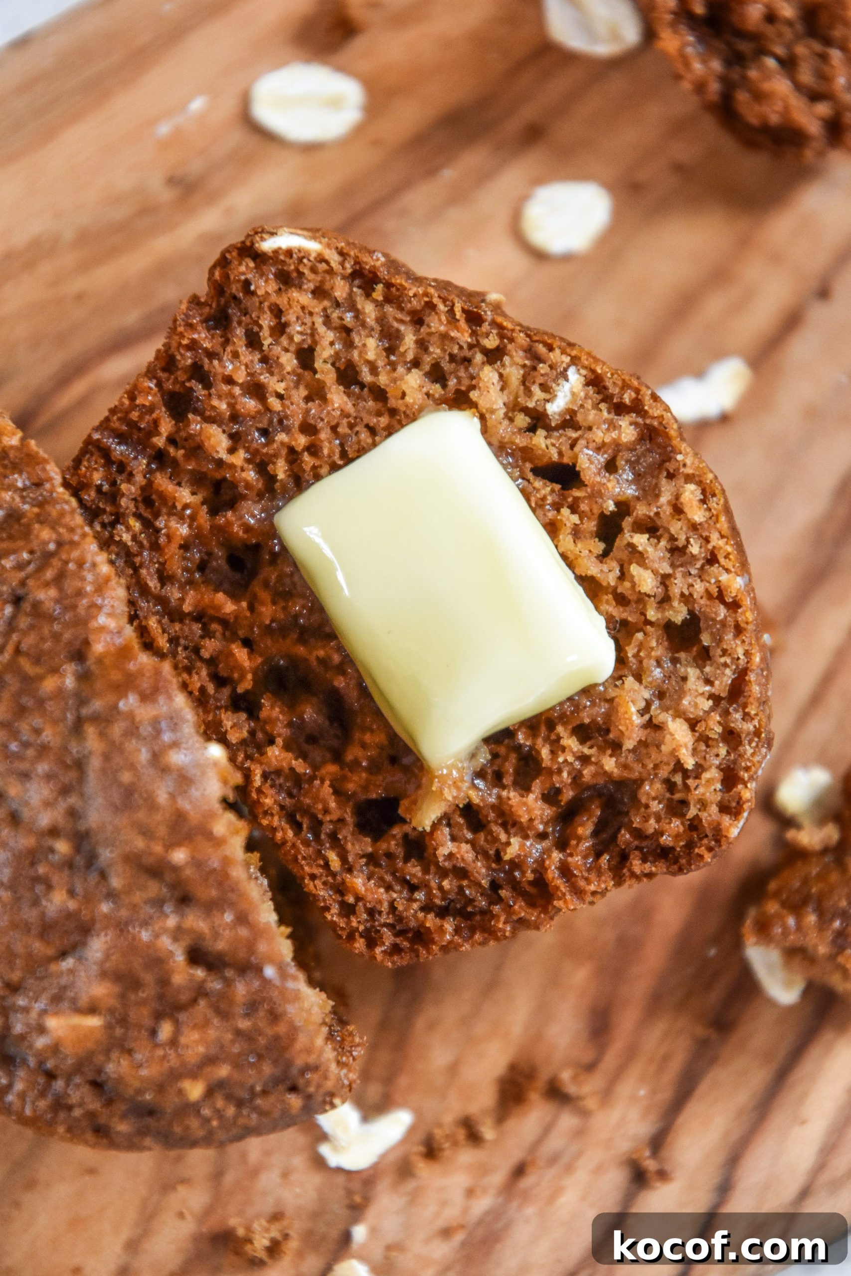 oatmeal applesauce blender muffin cut in half with butter