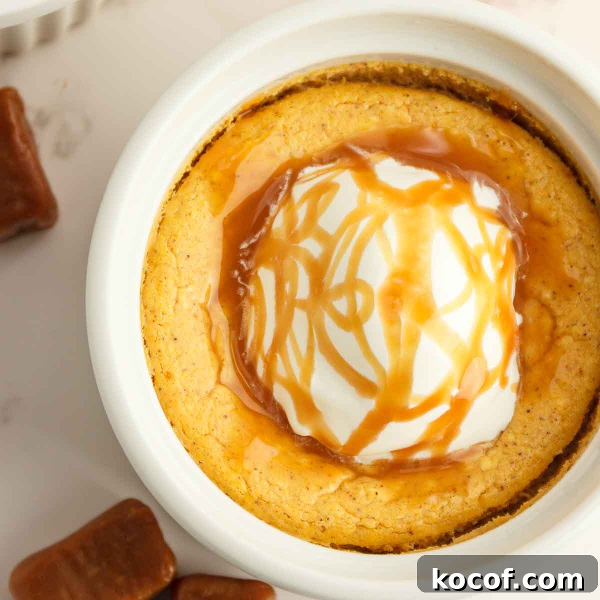 Garnishing and serving the keto pumpkin cheesecakes.