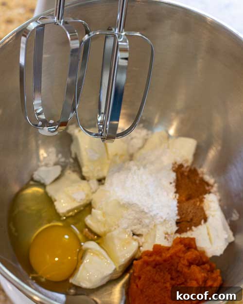 Mixing the cheesecake batter.