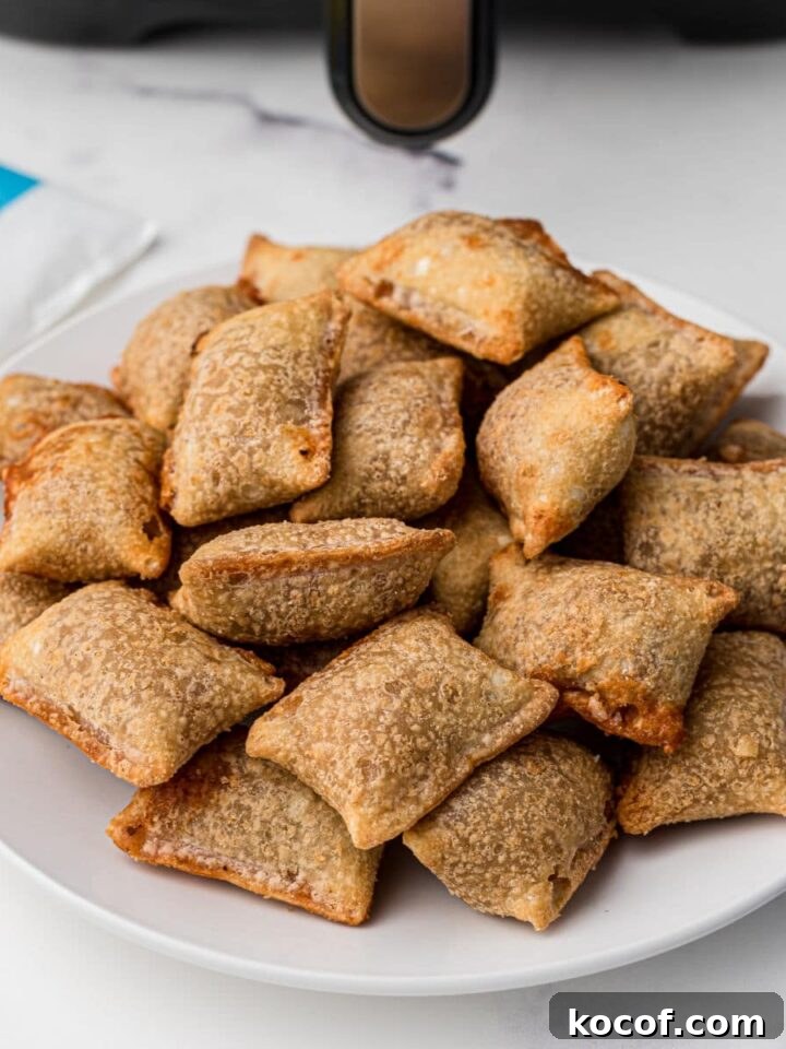 a plate full of air fryer pizza rolls