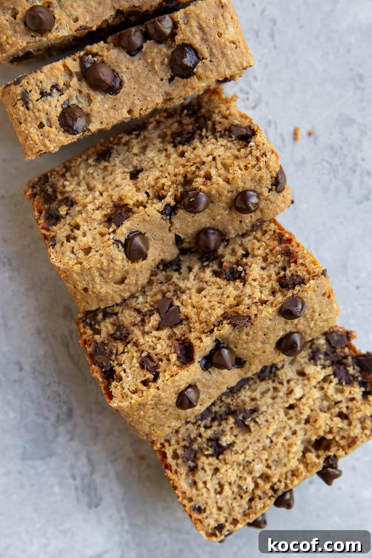 Loaf of chocolate chip bread, cut into slices.